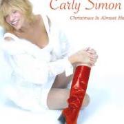 Der musikalische text WHITE CHRISTMAS von CARLY SIMON ist auch in dem Album vorhanden Christmas is almost here again (2003)
