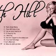 Der musikalische text THIS KISS von FAITH HILL ist auch in dem Album vorhanden The hits (2007)