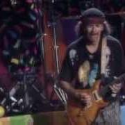 Der musikalische text ANGELS ALL AROUND US von SANTANA ist auch in dem Album vorhanden Sacred fire (1993)