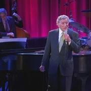 Der musikalische text THE CHRISTMAS WALTZ von TONY BENNETT ist auch in dem Album vorhanden A swingin' christmas