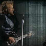 Der musikalische text BEAUTIFUL WORLD von BON JOVI ist auch in dem Album vorhanden What about now (2013)