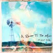 Der musikalische text BABY BLUE EYES von A ROCKET TO THE MOON ist auch in dem Album vorhanden On your side (2009)