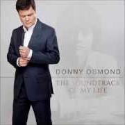 Der musikalische text MOON RIVER von DONNY OSMOND ist auch in dem Album vorhanden The soundtrack of my life (2014)