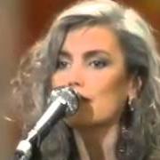 Der musikalische text GET UP JOHN von EMMYLOU HARRIS ist auch in dem Album vorhanden At the ryman (1992)