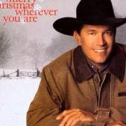 Der musikalische text SANTA'S ON HIS WAY von GEORGE STRAIT ist auch in dem Album vorhanden Merry christmas wherever you are (1999)