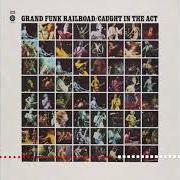Der musikalische text CLOSER TO HOME von GRAND FUNK RAILROAD ist auch in dem Album vorhanden Caught in the act (1975)