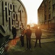 Der musikalische text LET ME IN von HOT HOT HEAT ist auch in dem Album vorhanden Happiness ltd. (2007)