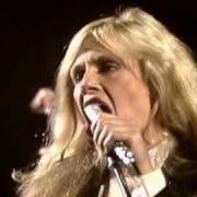 Der musikalische text VOYEUR von KIM CARNES ist auch in dem Album vorhanden Hits (2013)